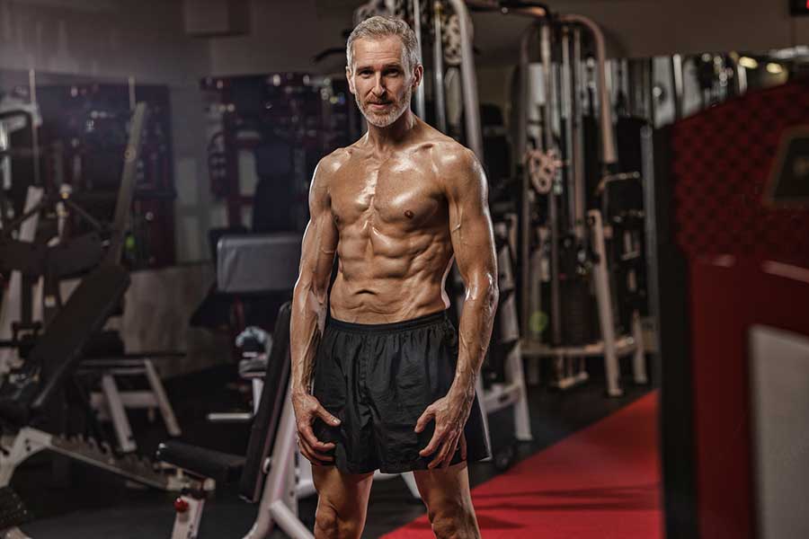 Daniel-in-the-gym-pose | Ultimate Performance | Ultimate Performance